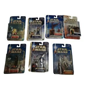 Collection of Vntage Star Wars Action Figures from the early 2000s unopened
